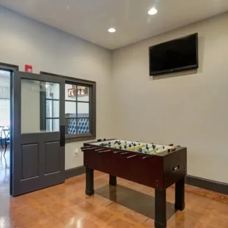 resident game room with foosball table
