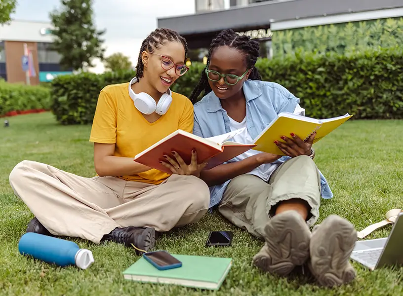two young college students studying